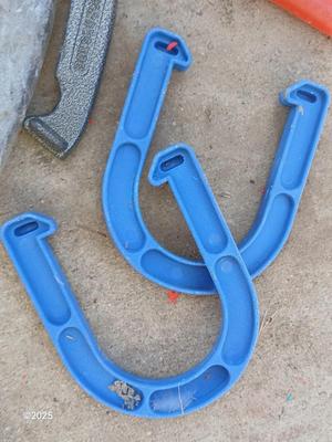 Two sets of horsehoes - one for adults - one for kids !