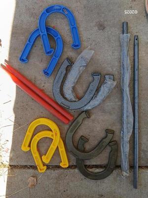 Two sets of horsehoes - one for adults - one for kids !