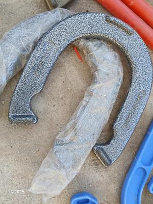 Two sets of horsehoes - one for adults - one for kids !