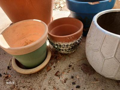 Assortment of small ceramic and terra cotta flowerpots - planters - Pots -