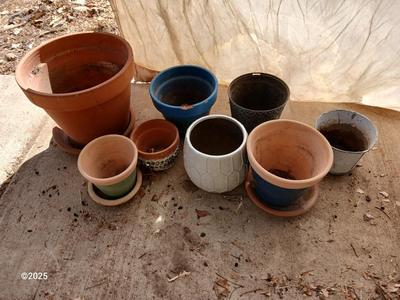 Assortment of small ceramic and terra cotta flowerpots - planters - Pots -