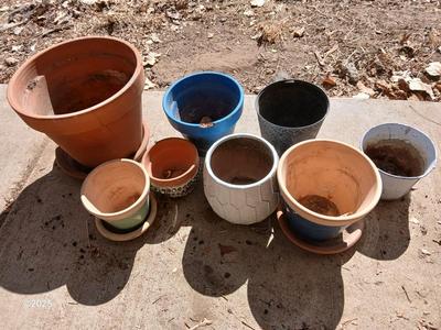Assortment of small ceramic and terra cotta flowerpots - planters - Pots -