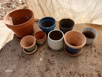 Assortment of small ceramic and terra cotta flowerpots - planters - Pots -