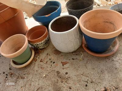 Assortment of small ceramic and terra cotta flowerpots - planters - Pots -
