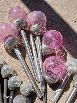 Solar lights with colored and clear glass bulbs