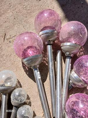 Solar lights with colored and clear glass bulbs
