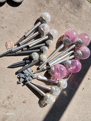Solar lights with colored and clear glass bulbs