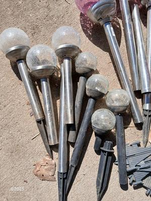 Solar lights with colored and clear glass bulbs