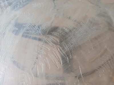 HUGE patio table with leaf imprint design on glass, 6 patio chairs and an umbrella stand