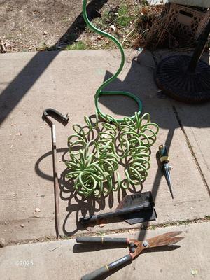 Garden hose, sprinklers, anda few handtools