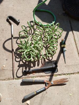 Garden hose, sprinklers, anda few handtools