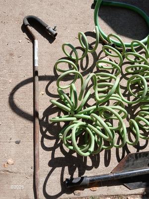 Garden hose, sprinklers, anda few handtools