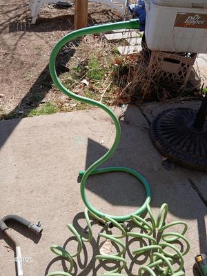 Garden hose, sprinklers, anda few handtools