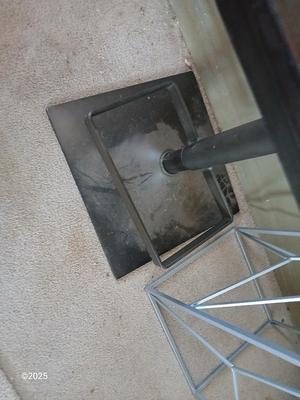 Farm bar stool and a mirrored topped metal framed small table
