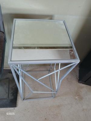 Farm bar stool and a mirrored topped metal framed small table