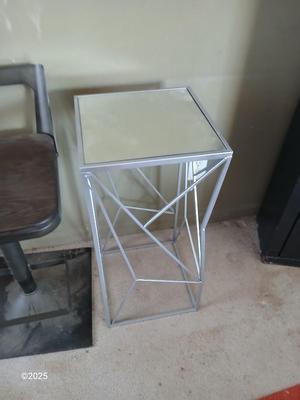 Farm bar stool and a mirrored topped metal framed small table