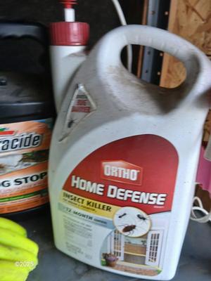 Yard and Garden Chemicals with rubber-like gloves