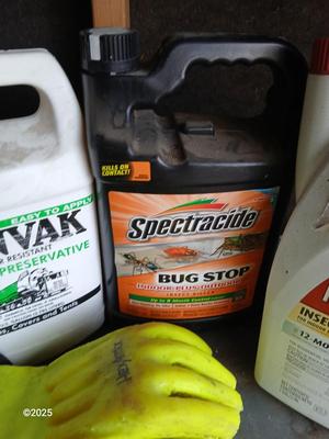 Yard and Garden Chemicals with rubber-like gloves
