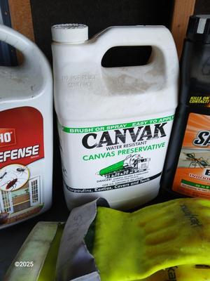 Yard and Garden Chemicals with rubber-like gloves