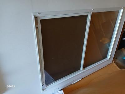 Brand new never installed EMCO K900 Series Storm door with Large pet entry system 36" x 80"