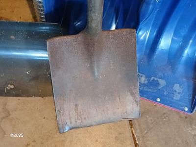 Two shovels and a square scoop shovel