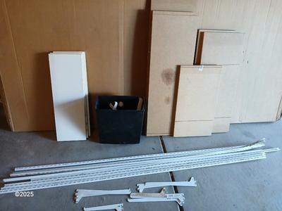 Vertical wall shelf brackets and rails with wooden shelves and a new closet organizing system