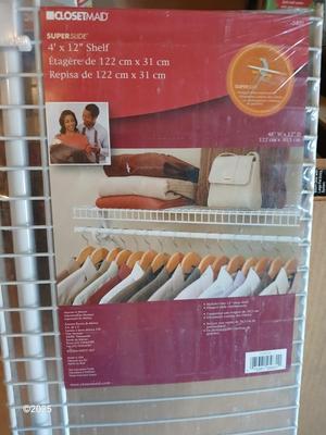 Vertical wall shelf brackets and rails with wooden shelves and a new closet organizing system