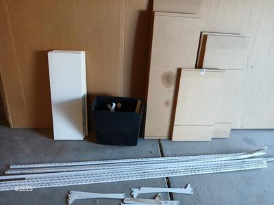 Vertical wall shelf brackets and rails with wooden shelves and a new closet organizing system