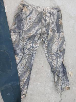 2x large Spartan outdoors camo pants and a pair of Remington bib waders for fishing and irrigating