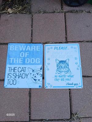 Two light metal / tin humorous signs