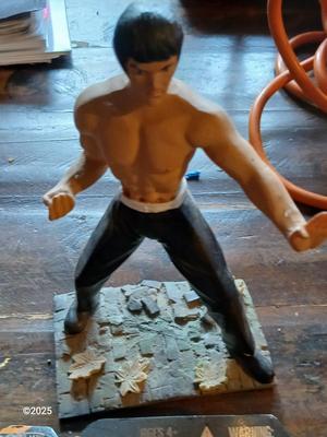 Star wars C-3PO Figure and a figure of Bruce Lee