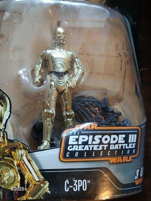 Star wars C-3PO Figure and a figure of Bruce Lee