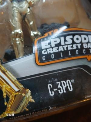 Star wars C-3PO Figure and a figure of Bruce Lee