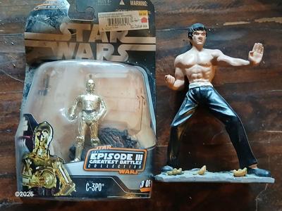 Star wars C-3PO Figure and a figure of Bruce Lee