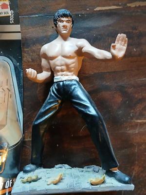 Star wars C-3PO Figure and a figure of Bruce Lee