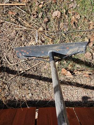 Yard and garden handtools - shovel - bow rake and another scraper tool
