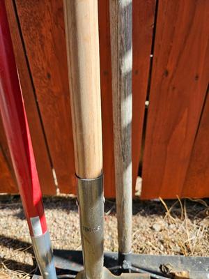 Yard and garden handtools - shovel - bow rake and another scraper tool