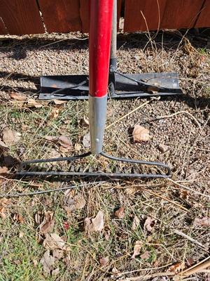 Yard and garden handtools - shovel - bow rake and another scraper tool