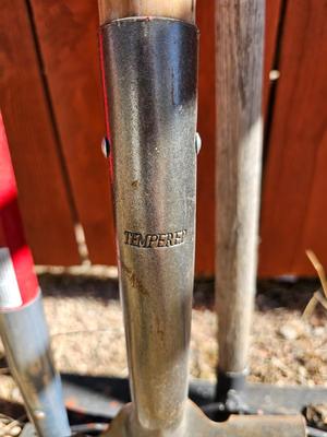 Yard and garden handtools - shovel - bow rake and another scraper tool