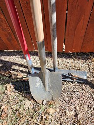 Yard and garden handtools - shovel - bow rake and another scraper tool