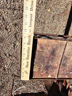 Rustic yard / garden art flower with small rusty table - and a shepherd's hook plant hanger
