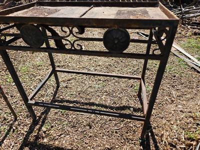 Rustic yard / garden art flower with small rusty table - and a shepherd's hook plant hanger