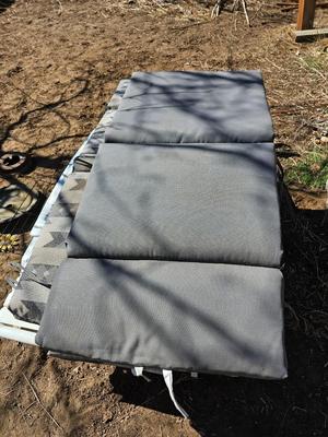 Three southwestern designed chair cushions