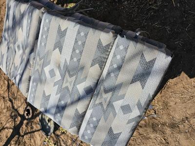 Three southwestern designed chair cushions