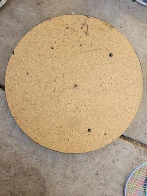 Badminton racquets - birdie - net - and a dart board