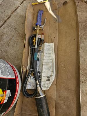 Propane torch weed burner with propane bottle