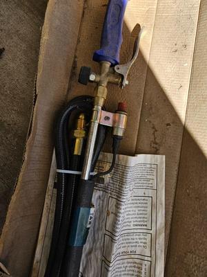 Propane torch weed burner with propane bottle