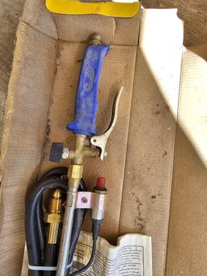 Propane torch weed burner with propane bottle