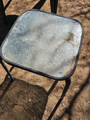 Patio chair - bar stool - and a small outdoor patio table