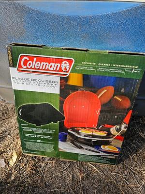 Rubbermaid cooler and a new Coleman griddle and a small umbrella